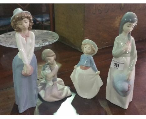 A Group of Four Nao Figures.