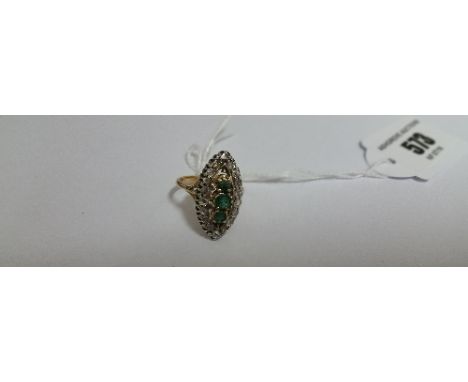 An Antique Diamond and Emerald Marquise Ring.