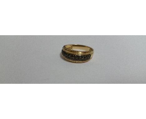 A 9ct Black and White Diamond Ring.