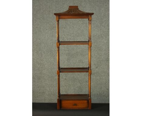 A Chippendale style mahogany whatnot, with a Pagoda roof over shelves with turned supports, above a single drawer. H.91 W.33 