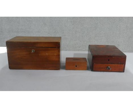 Three mahogany boxes, including a converted tea caddy, an offertory or safe box, and a flame mahogany box with a single drawe