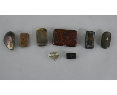 A collection of eight early 20th century snuff boxes, including a purple mussel shell box, a burr walnut box, a papier-mâché 