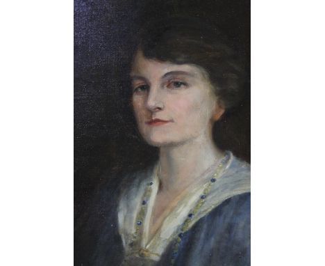 A gilt framed early 20th century oil on canvas portrait of an Edwardian lady, indistinctly signed and dated 1918. H.74 W.60cm
