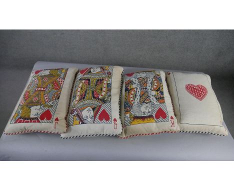 A set of four playing card cushions, comprising the King of Hearts, Queen of Hearts, Jack of Hearts and Ace of Hearts. H.50 W