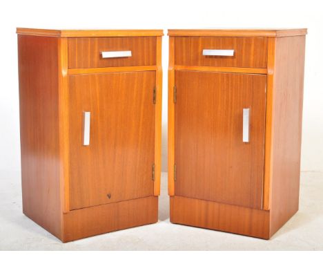 A pair of retro vintage mid 20th Century teak wood bedside cabinets. Of square form with single drawer to top, cupboard under