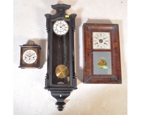 An early mid 20th Century Vienna regulator type wall clock with white enamel dial having Roman numeral chapter ring with face