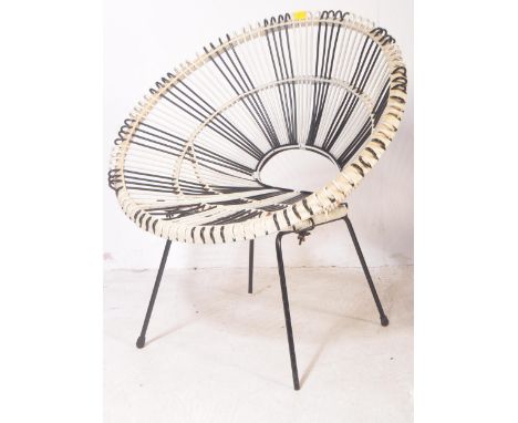 A vintage retro 20th century circa. 1960's&nbsp;wire sputnik style egg / satellite chair having wire seat black tubular suppo