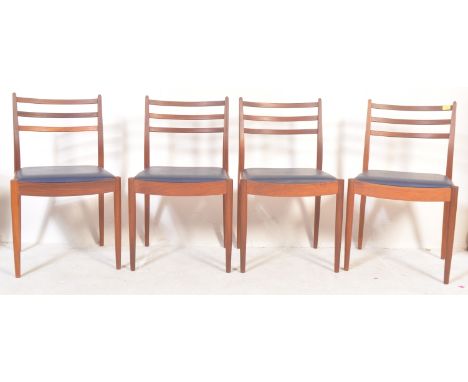A set of four G Plan E Gomme mid 20th Century retro vintage dining chairs. Having three horizontal slatted backrest, blue vin