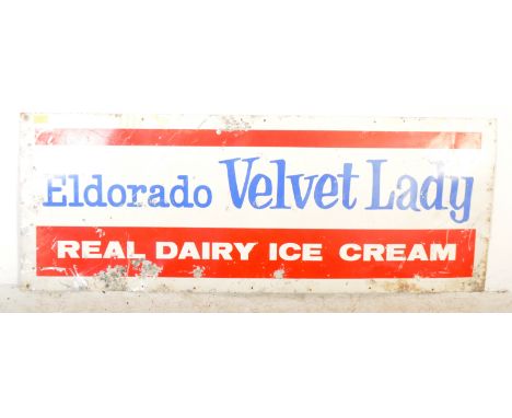 A vintage mid 20th Century Eldorado velvet lady ice cream sign. Of rectangular shape, with a white back ground blue font with