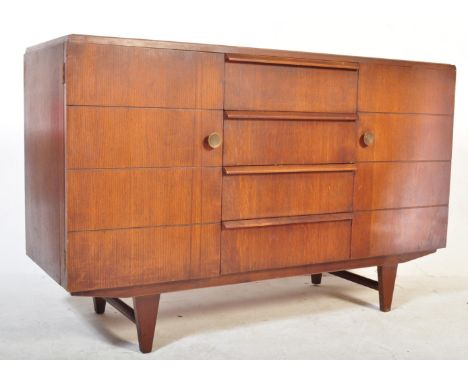 A retro vintage mid 20th Century circa 1940's oak sideboard. Of rectangular form with a bank 4 drawers to the centre flanked 