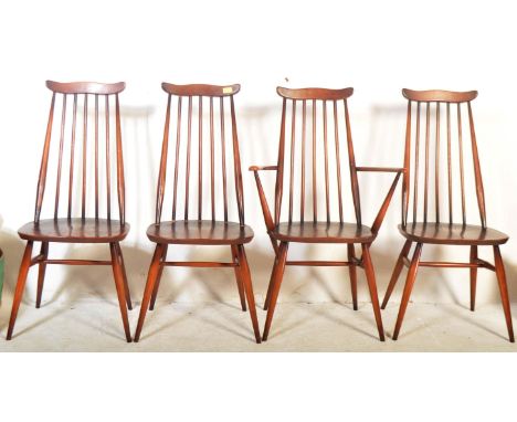 Ercol - A set of four retro vintage mid 20th Century beech and elm Goldsmith golden dawn dining chairs. Having a tall curved 