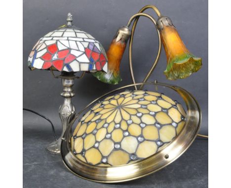 A collection of 20th century Art Nouveau style glass lamps and ceiling light to include a Tiffany style desk lamp with staine