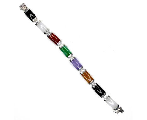 A Chinese silver bracelet, formed of eight panels of multi coloured jade, press clasp, 0.9 by 19cm long, 6.2cm diameter when 