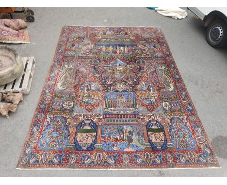 A modern bordered Persian Carpet with numerous panels of animals, birds, vases and hieroglyphics, palmette and bird border, 1