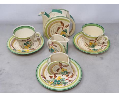 A Clarice Cliff Tea-for-Two Tea Service, Stanford Shape, and decorated green hydrangea pattern, including a covered Teapot, a