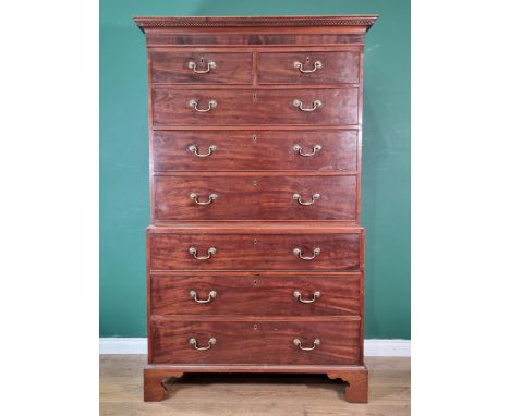 A George III mahogany Chest on Chest with dentil cornice above two short and six long drawers on bracket feet, 3ft 6in wide 