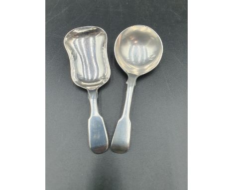 A Victorian silver Caddy Spoon fiddle pattern, London 1868, maker: G.A, and another, Exeter 1839 