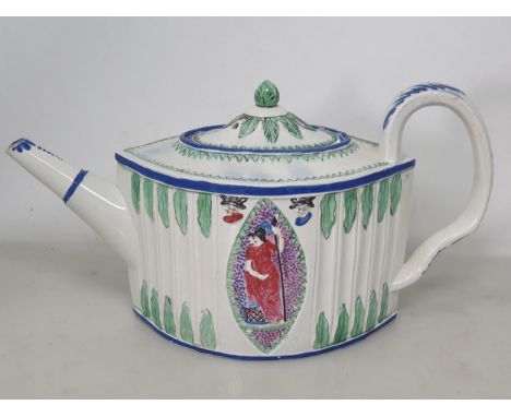 A Teapot, the lid with bud finial, the body with two oval panels with moulded figure decorations with shaped handled and tape
