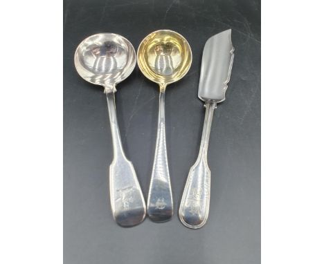A Victorian silver Butter Knife fiddle and thread pattern, London 1849, a Sauce Ladle old english pattern, London 1794,  and 