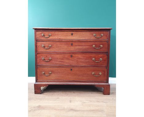 A George III mahogany Chest with moulded top above four long graduated drawers raised on ogee bracket supports 3ft 2in W x 2f