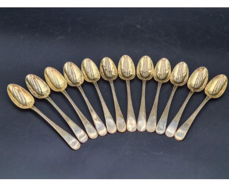 A matched Set of silver-gilt Cutlery engraved bird crests, viz: 12 Table Spoons Onslow pattern, London 1780, 12 Knives, Londo