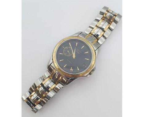A gentleman's Zenith Elite Automatic Wristwatch the black dial with hourly gold tapered baton markers, date aperture at 3 o'c