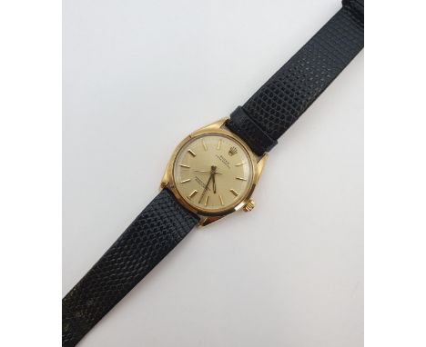 A Gentleman's 1970's Rolex Oyster Perpetual Wristwatch the  brushed gold dial with hourly baton markers and sweep seconds han