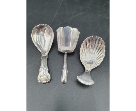 A George III silver Caddy Spoon king's pattern, Birmingham 1818, maker: J Willmore, repaired,  another, bright cut with shell