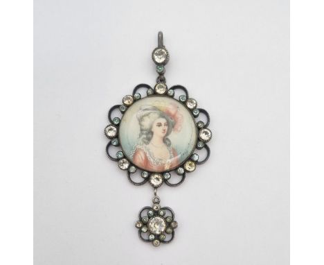 A painted portrait miniature Pendant depicting 18th Century lady wearing hat with pink feathers, on ivory in scalloped white 