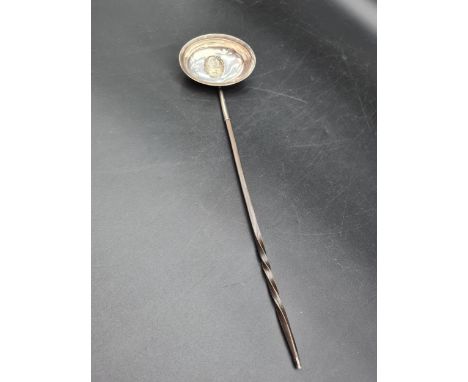 A George III Toddy Ladle with coin inset oval bowl, spiral whalebone handle, London 1802 