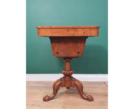 A Victorian burr walnut Sewing Table with marquetry inlaid top, fitted interior on turned and carved column and tripod base