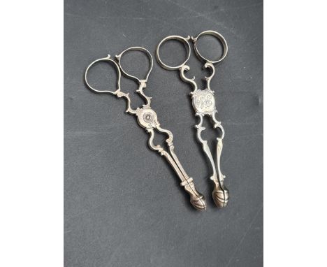 Two pairs of Georgian silver Chippendale style Sugar Nips engraved initials 