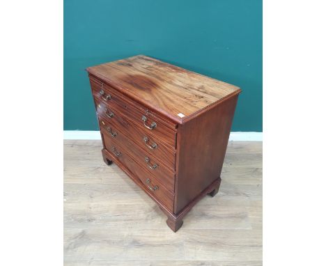 A Georgian mahogany Chest fitted brushing slide above four long graduated drawers on bracket supports, 2ft 11in W x 2ft 9 1/2