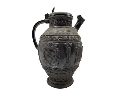 German Rhenish stoneware ewer, the pewter lid inscribed 'M B 1665' decorated with hatched panels, the spout with pewter cover