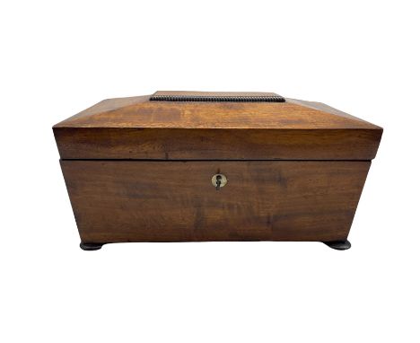 Mid 19th century mahogany sarcophagus shape tea caddy, the interior with two covered containers and bowl recess on compressed