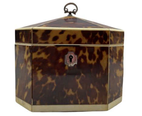 Early 19th century tortoiseshell tea caddy of octagonal design, inlaid with ivory stringing and with pagoda cover W13cm