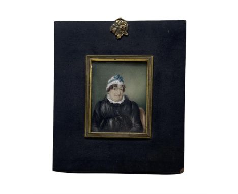 19th century miniature half length portrait on ivory of a lady wearing a lace cap 7.5cm x 6cm