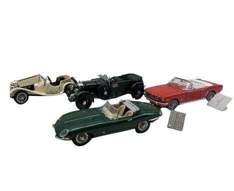 Four Franklin Mint 1:24 scale models to include 1961 Jaguar E-Type, 1964 1/2 Ford Mustang, 1929 Bentley and Jaguar SS-100, tw