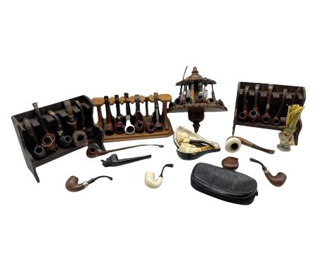 Collection of pipes including a Orlik Hurricane, two carved meerschaum pipes, Parker pipe,  and others including ceramic and 