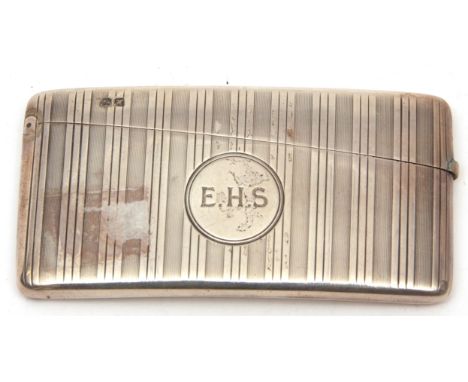 Edward VII silver card case of shaped rectangular form, with hinged cover and engine turned striped decoration to an initiall