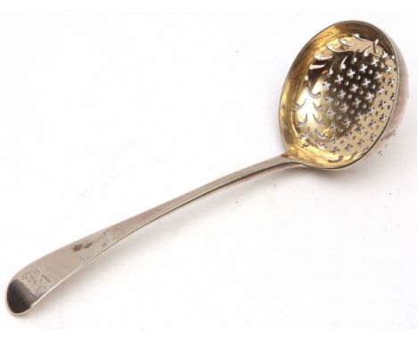 George III Old English pattern ladle, bearing marriage crests to a pierced and gilt lined circular bowl, 6 1/16ins long, weig