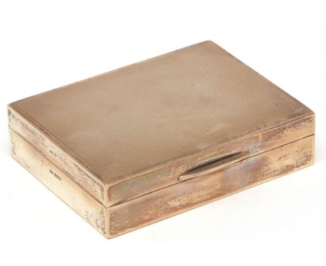 Elizabeth II table cigarette box of hinged rectangular form with engine turned and hinged cover and timber lined interior, wi