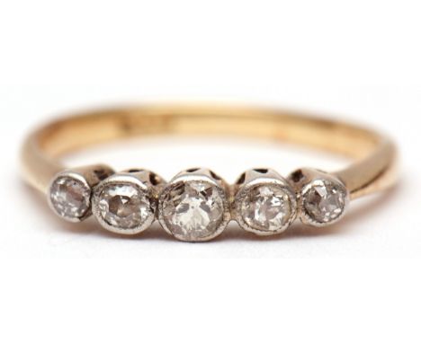 Precious metal five stone diamond ring, set with 5 small graduated single cut diamonds (0.25ct approx), all in rub-over mount