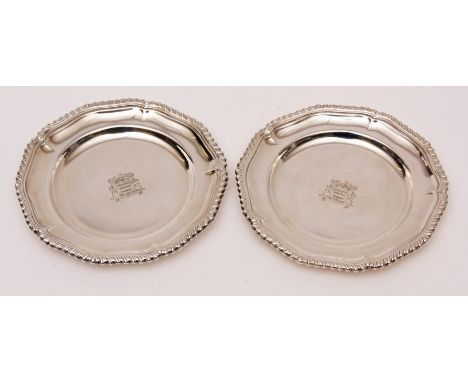 Two Elizabeth II side plates, each of lobed form with gadrooned borders and engraved centres, diam 6ins, combined weight appr