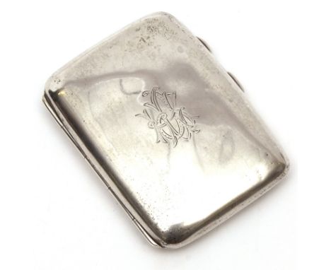 George V cigarette case of hinged rectangular form with polished covers, central monogram with sprung clasp, height 3 1/4 ins