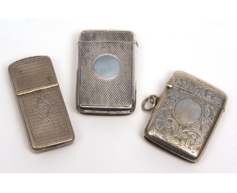 Mixed Lot: two various vesta cases, each of rectangular form, with hinged and sprung covers, engraved and engine turned decor