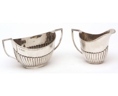 Victorian sugar basin and milk jug, each of half-fluted oval form, combined weight approx 148gms, Sheffield 1894, makers mark