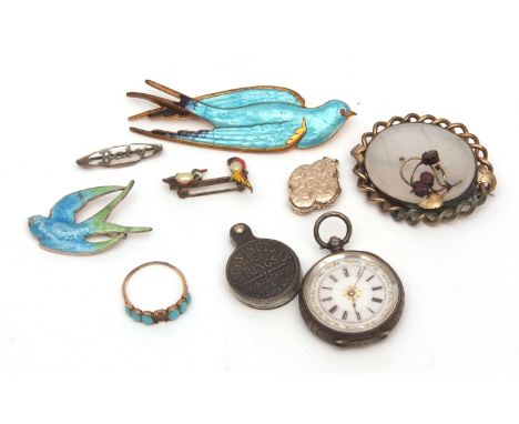 Mixed Lot: two enamel bird brooches (a/f), a white metal and enamel dial fob watch, a ring gauge, a painted parrot brooch, tu