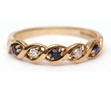 Modern 9ct gold sapphire and diamond ring, pierced Celtic design, alternate set with three small circular cut sapphires and t