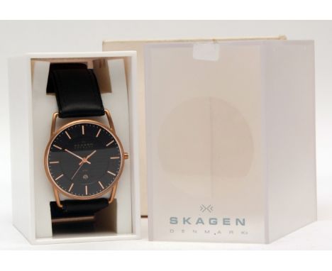 Modern centre seconds calendar wristwatch, Skagen, the quartz movement to a black dial with sunk centre, outside minute track
